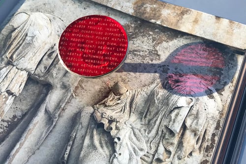 Image of "A fragment from Late Ancient Roman hymn to Sun.." silver ring with red acrylic glass 45mm