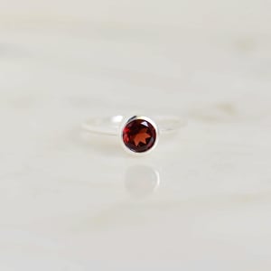 Image of Fire Red Garnet round star cut classic silver ring