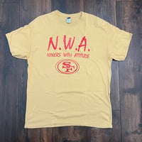 Image 1 of N.W.A. "NINERS WITH ATTITUDE" GOLD T-SHIRT, RED LETTERS