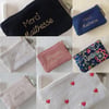 Pochette gaze de coton et broderie dorée 
