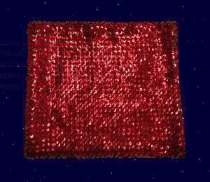Red sequinned mini skirt/ tube top