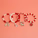 Image of DST Red and White Charm Bracelet 