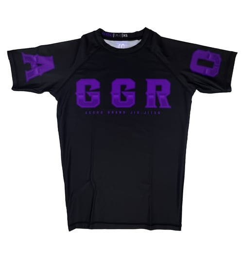 Image of AGGRO BRAND "RISE ABOVE" RASHGUARD (white/blue/purple/brown/black)