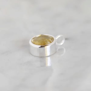 Image of Golden Rutilated Quartz round cut silver necklace