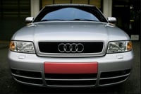 Image 1 of AUDI S4 B5 FRONT LICENSE PLATE FILLER 