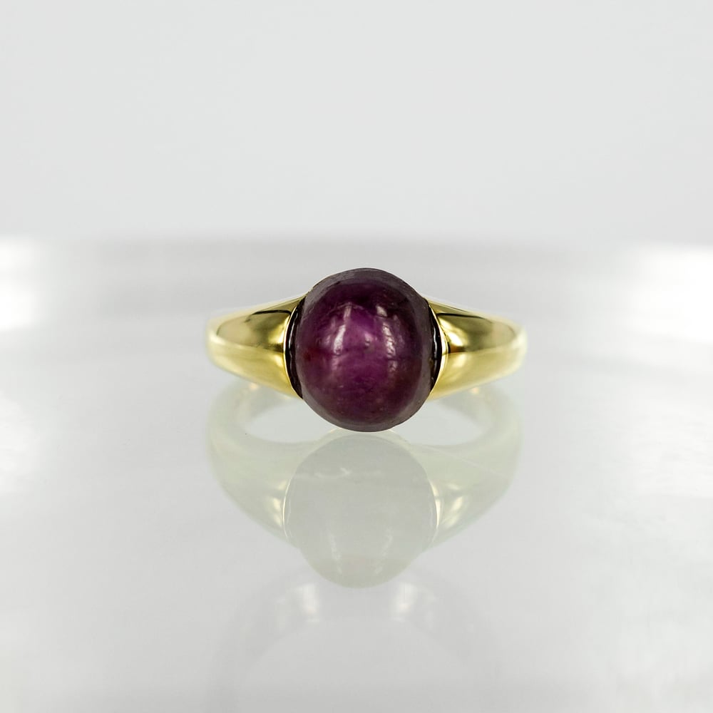 Image of 9ct yellow gold dress ring with a cabochon Ruby. PJ5957