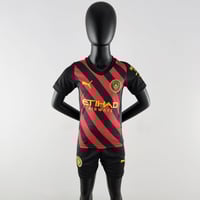 Image 1 of Manchester City 22/23 Away Kids Kit