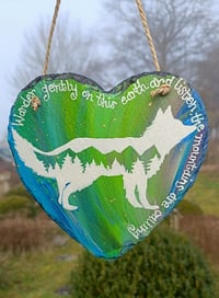 Arctic fox on slate heart