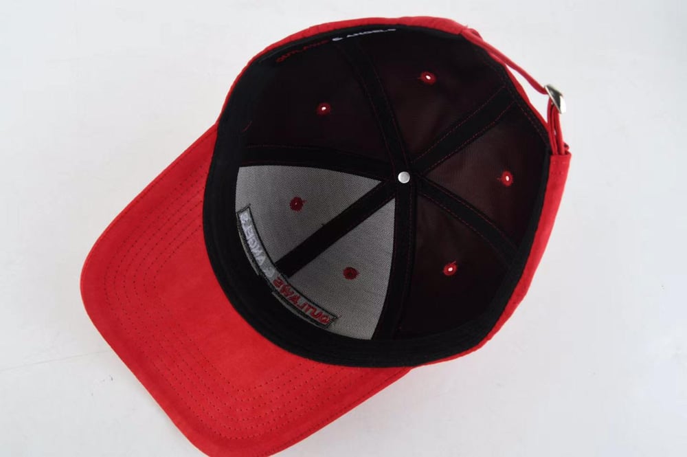 Image of red suede