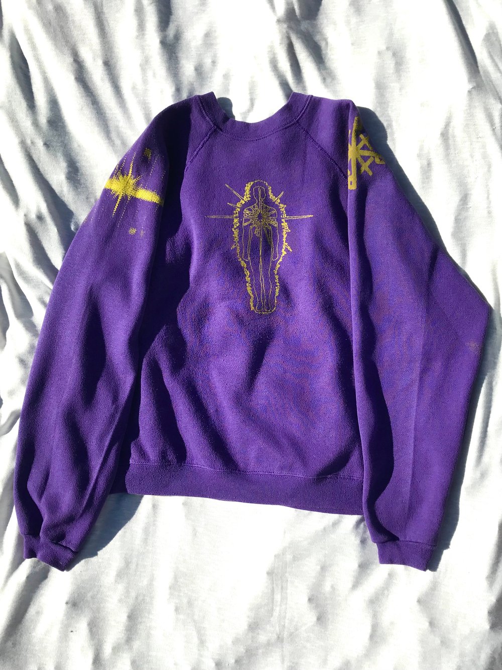 this lil light sweater shirt in purple 