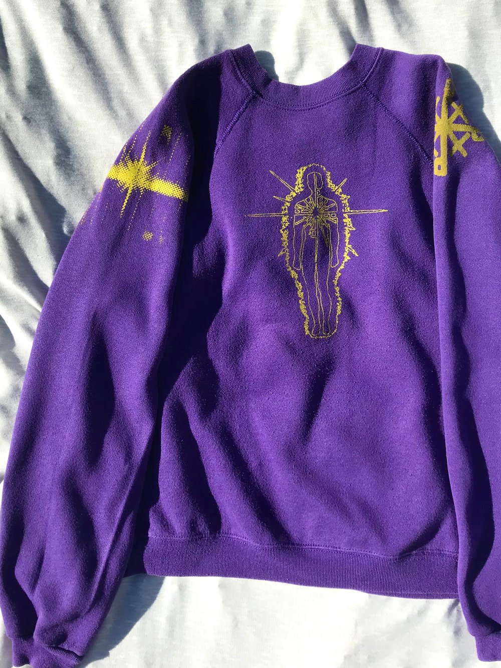 this lil light sweater shirt in purple 