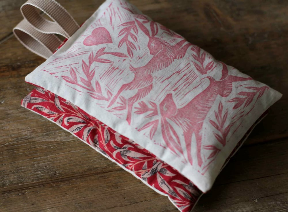 Image of Loving hares linocut lavender bag/ hand warmer with Willaim Morris fabric