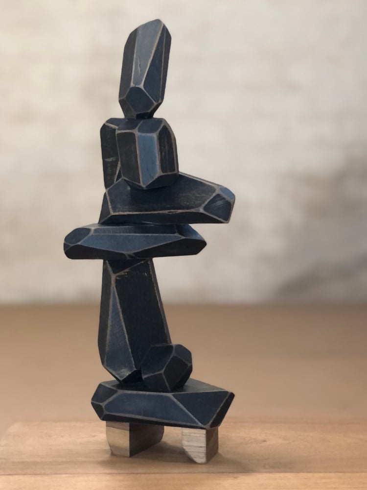 Image of solid teak sculpture (black)