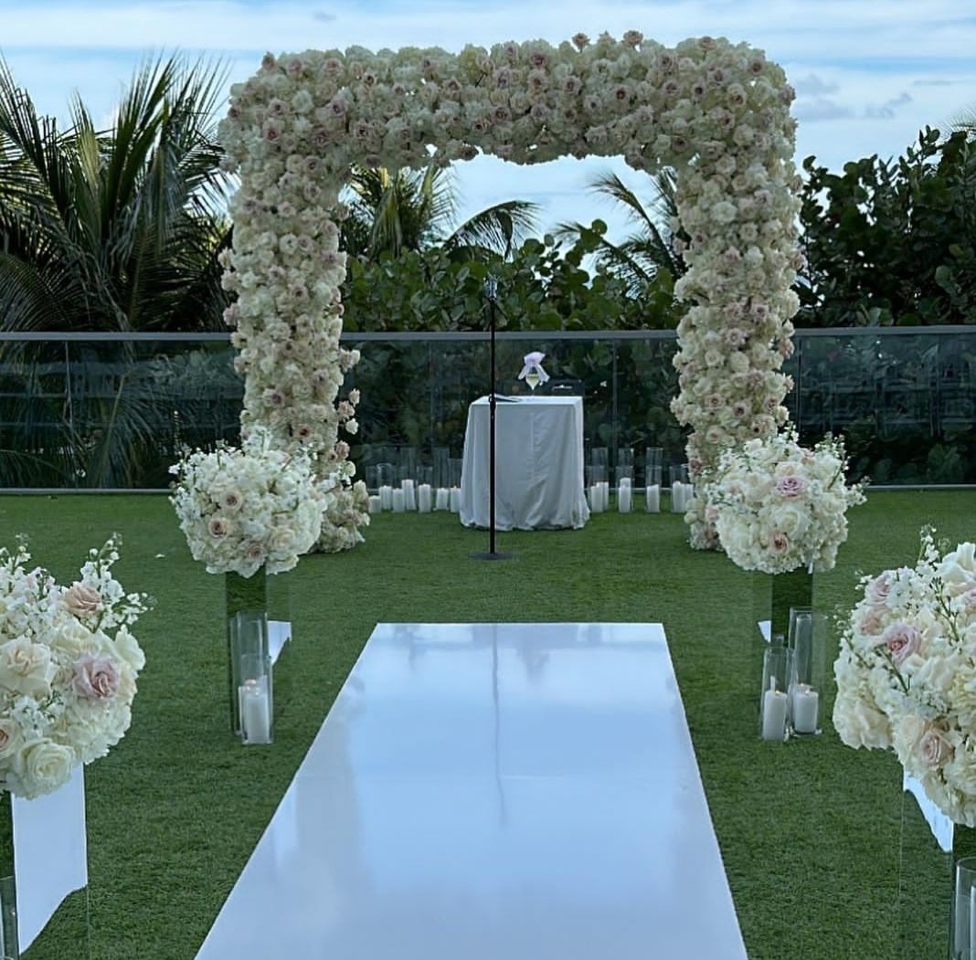 WHITE WEDDING AISLE AS SEEN WITH ARTIFICIAL FLOWERS SQUARE BACKDROP ...