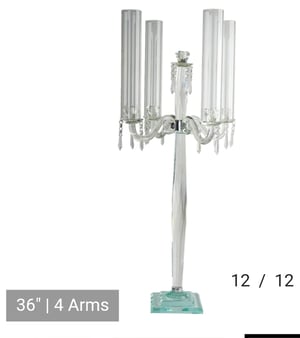 Image of Crystal clear candlelabras centerpiece