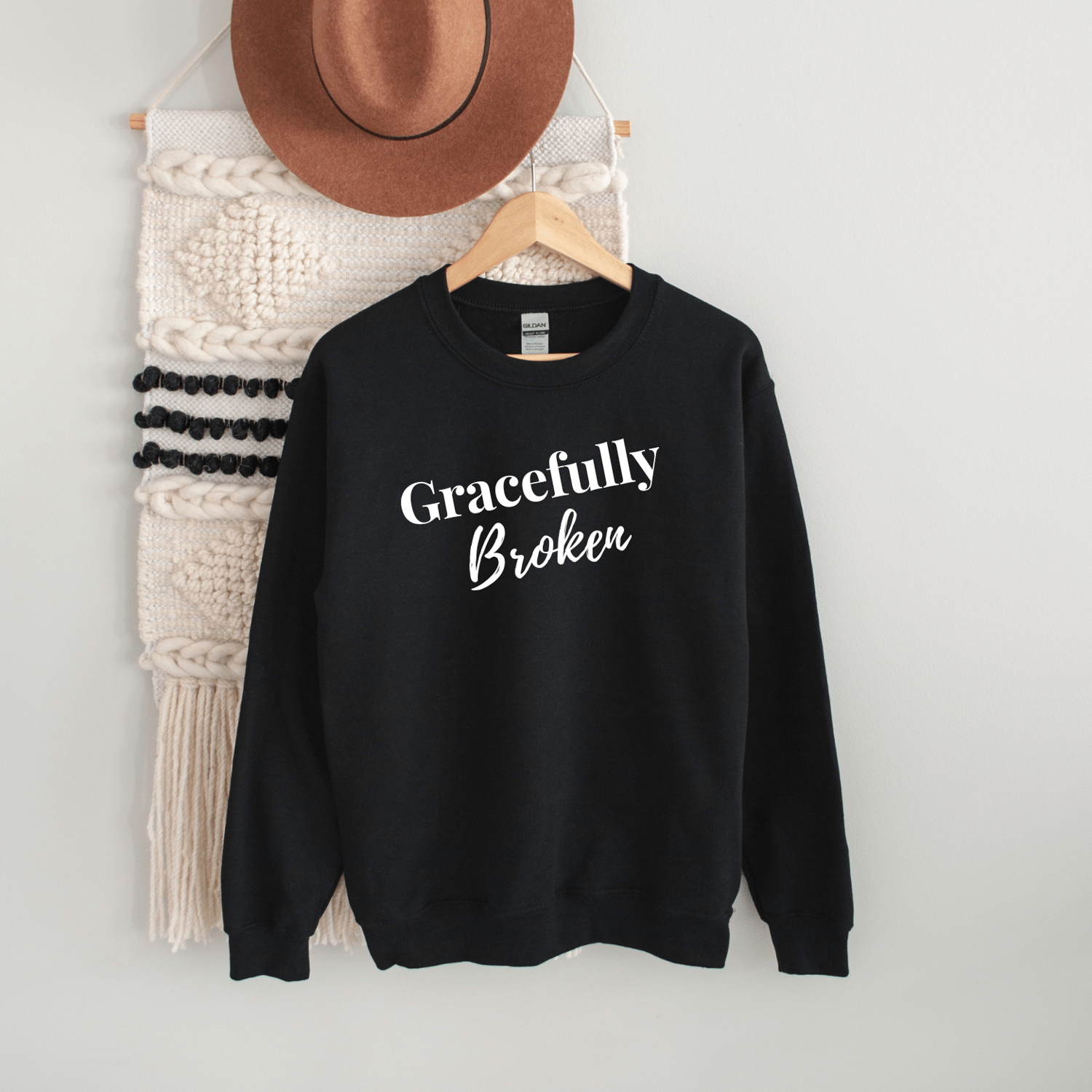 Image of Black Unisex Sweatshirt with White Wording