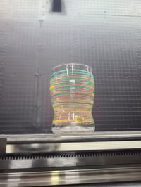 Image 1 of 8oz wrapped cup in red, yellow, and green