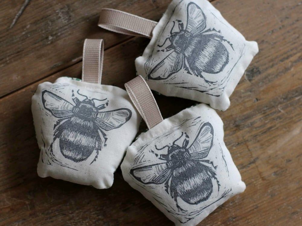 Image of Bumble bee linocut hanger with William Morris fabric