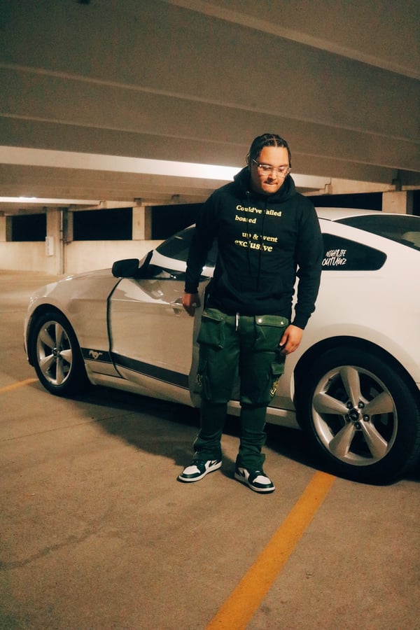 Image of Kelly Green, Yellow , amd Black Stacked Pants Outfit