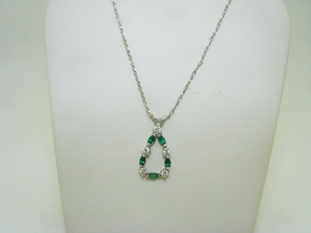 Image of Beautiful diamond and emerald necklace