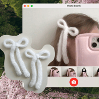 pair of fuzzy bows (white)
