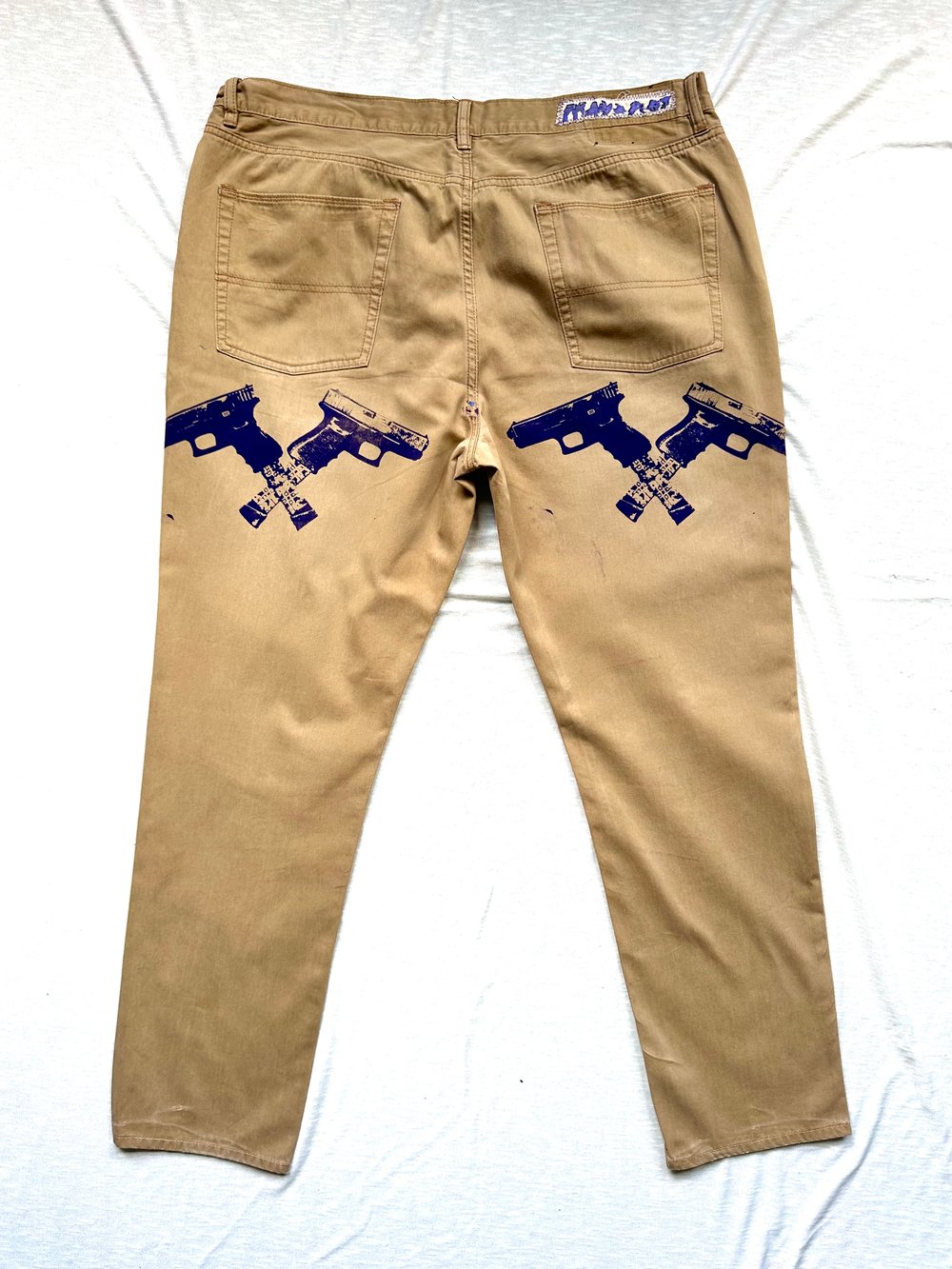 the cats ok khaki jeans