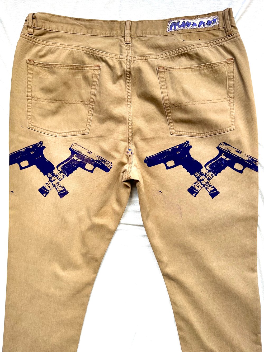 the cats ok khaki jeans