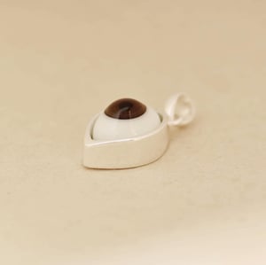 Image of FOXEYE antique ceramic x glass eye ball silver necklace