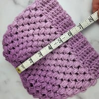 Image 5 of purple ponytail crocheted hat