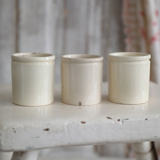 Set of little antique pots. 