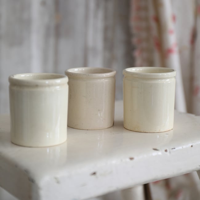 Set of little antique pots. 