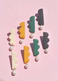 Image 1 of Sylvie Statement Drops