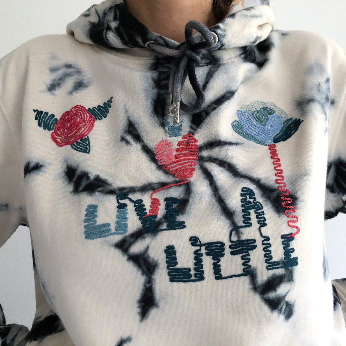 Live a little hand embroidered tie dye hoodie made of organic