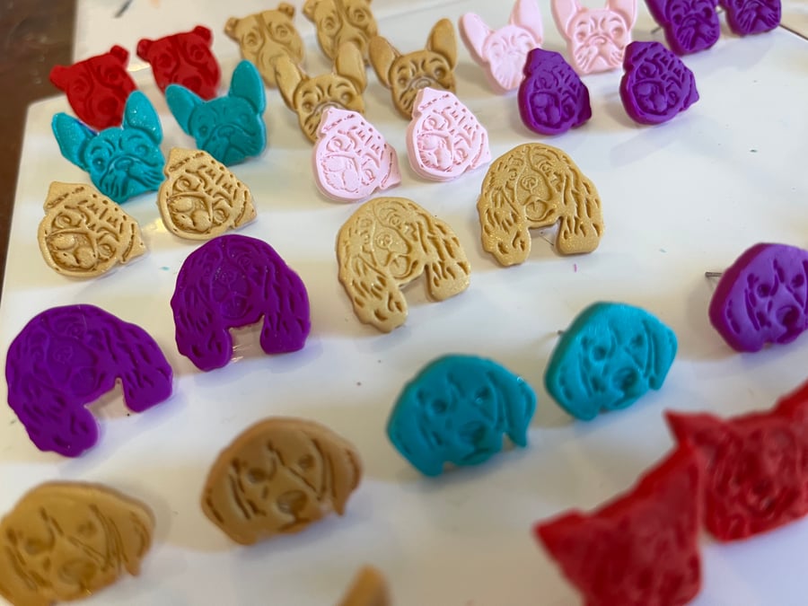 Image of Dog head studs 