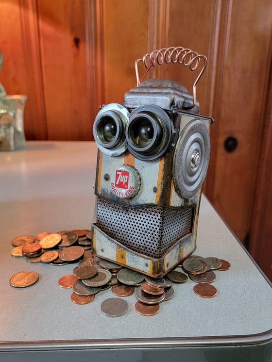 Image of Orange Quality king Robot penny bank