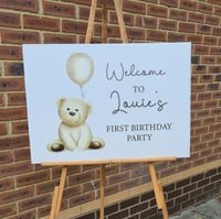 Nude Bear with Balloon Welcome Sign