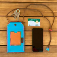 Image 5 of Funda de móvil azul y naranja