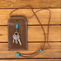 Image 4 of Funda de móvil marrón y azul