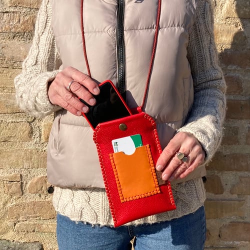 Image of Funda de móvil roja y naranja