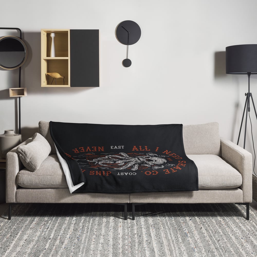 Skullpus Throw Blanket