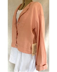 Image 5 of slightly cropped collarless jacket with bell sleeves
