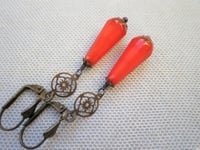 Image 4 of Art deco bronze floral cut out earrings handmade with faceted opaque red coral Czech glass drops