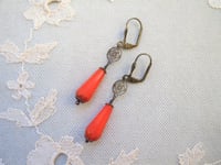 Image 5 of Art deco bronze floral cut out earrings handmade with faceted opaque red coral Czech glass drops