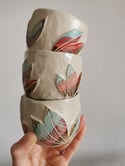 Juego de tacitas talladas. Carved cups set