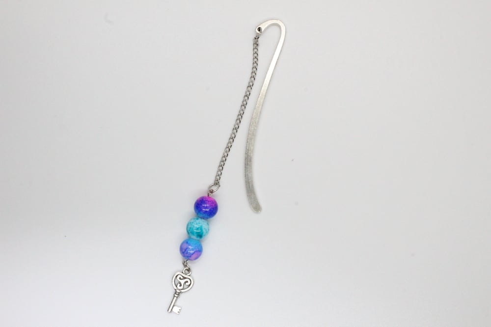 Image of Key to a New World Metal Hook Bookmark
