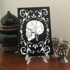 Circulation Skull And Fliligree Print On board