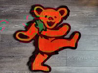 Image 1 of Grateful Dead Orange Bear (Pose 5) Handmade Rug