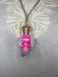 Image 1 of Pink Glitter Glass Skull Shaped Good Luck Gris Gris Necklace by Ugly Shyla 