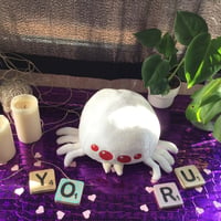 Albino spider plush