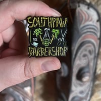 Image 1 of SOUTHPAW BARBERSHOP Shrunken Head Logo 1.75" Soft Enamel Pin
